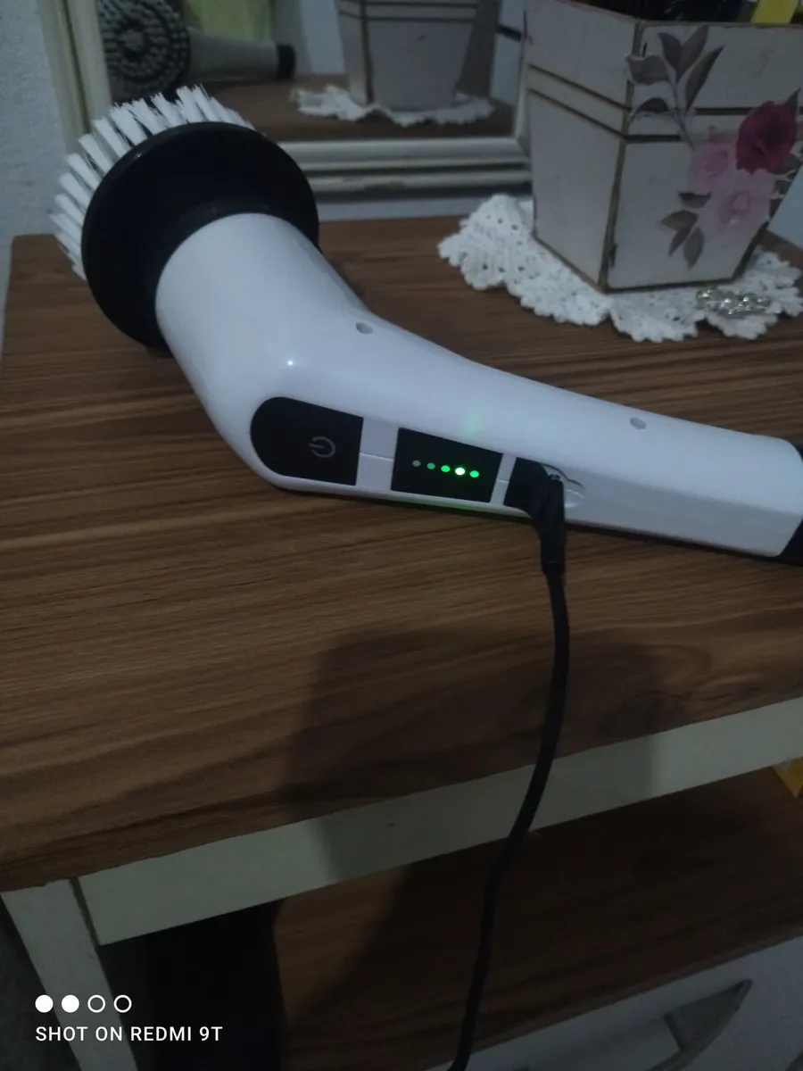 Escova carregando com indicador de bateria